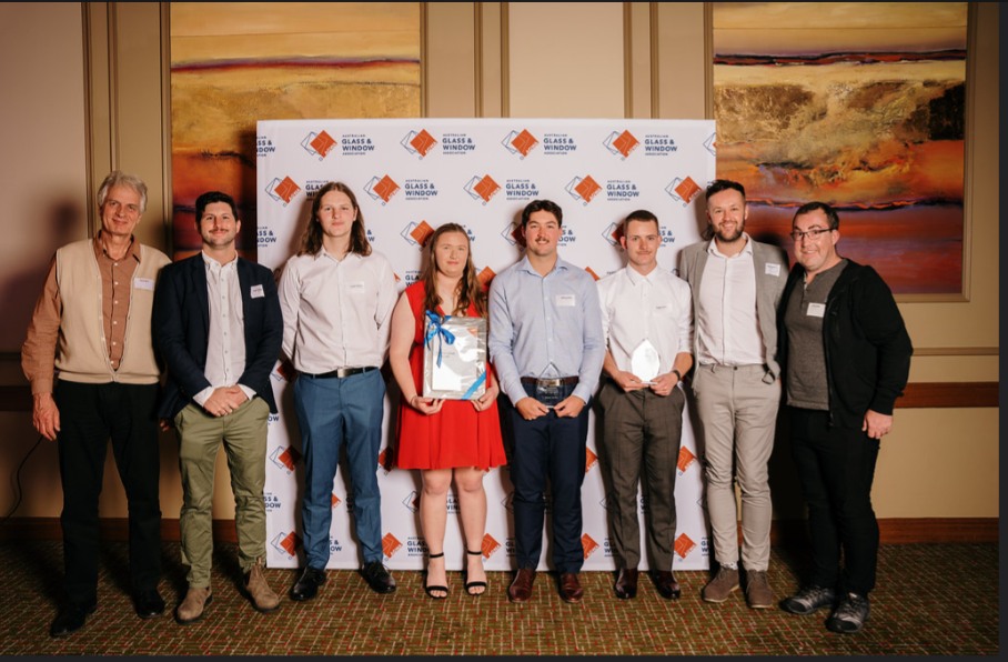 group of people standing for a photo